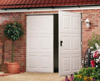 Side hinged steel garage doors