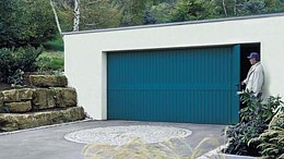blue finished steel up and over and pedestrian door