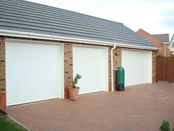 triple garage with insulated roller doors
