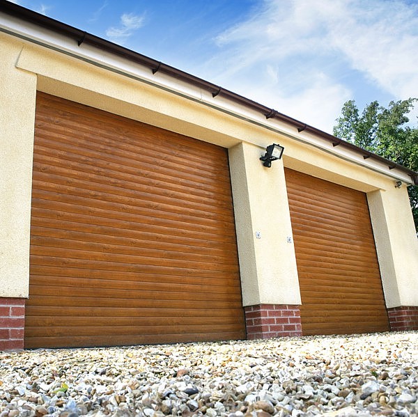 Golden Oak finish roller doors on a twin garage