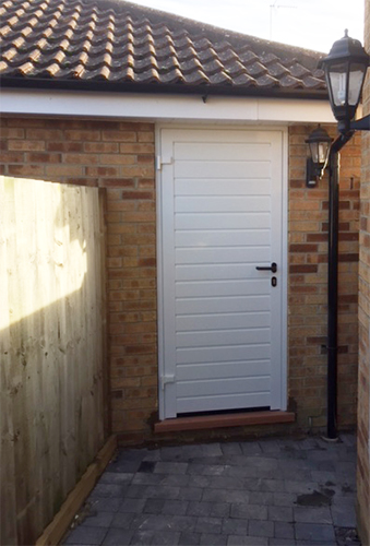 Pedestrian Door Specialized Door Within A Garage Door Door Doctor Garage Door Styles Garage Doors Garage Door Types