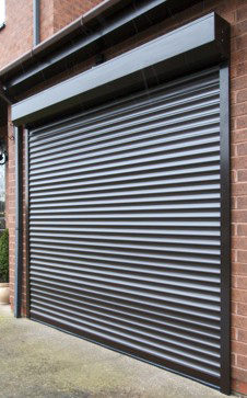 Externally fitted roller shutter garage doors