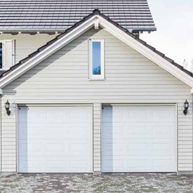 White Carteck sectional garage doors