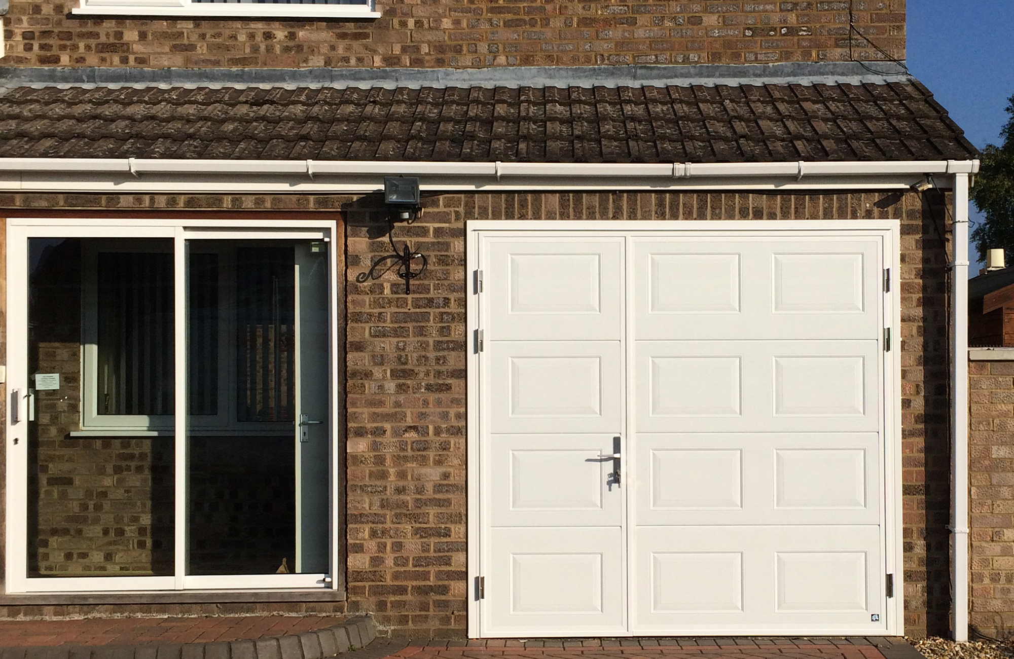The Garage Door Doors Kettering Wellingborough Garagedoors Have A Wide Range Of Side Hinged Garage Doors Manufactured In High Quality Steel Various Timber Types And Also Grp Fibreglass