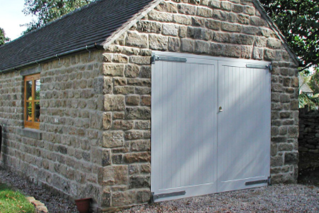 Side hinged garage doors