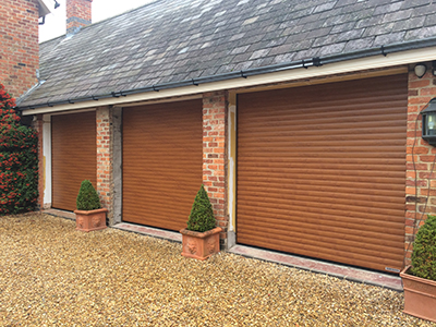 SeceuroGlide roller garage doors rise vertically in white